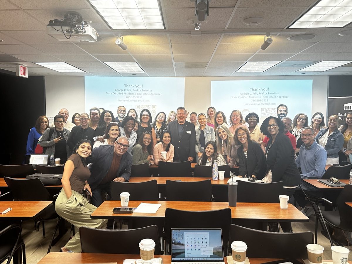 George Jalil with a full classroom of Realtors after a training session